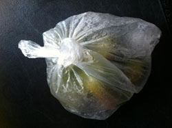 Roasted capsicums in plastic bag. Looks weird, but it works.